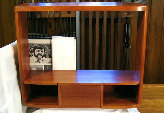 Distinctive Cheeks and Moustache Become Shelves and Drawer